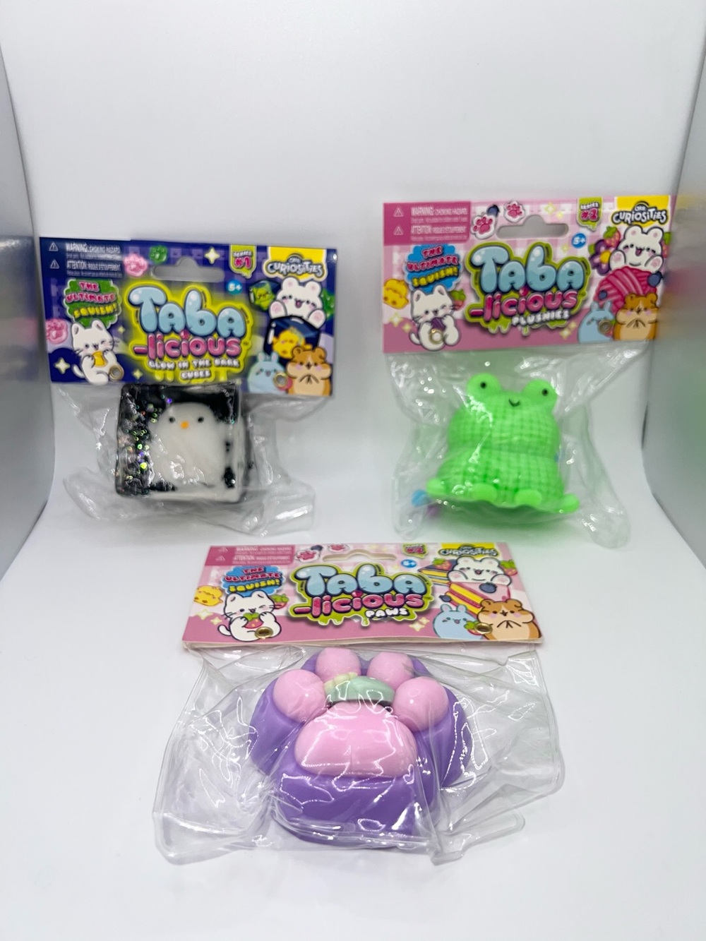 Tabalicious viral squishy bundle of 3 new squeeze paw frog penguin sensory toy